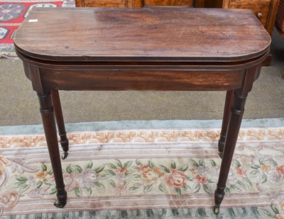 Lot 1167 - A George III Mahogany Foldover Tea Table, on...