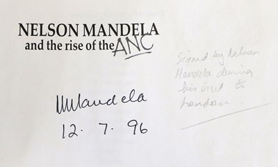 Lot 33 - Signed by Nelson Mandela. Schadeberg (Jurgen),...