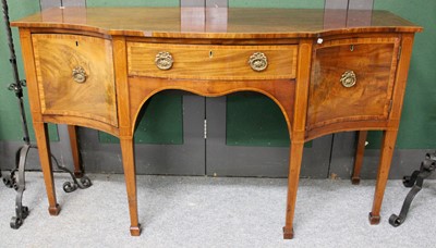 Lot 1253 - A Mahogany Serpentine Sideboard, 19th century,...