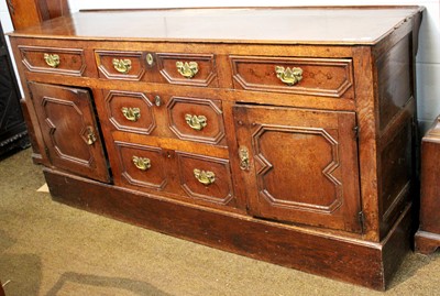 Lot 1195 - An 18th Century Oak Dresser Base, with moulded...