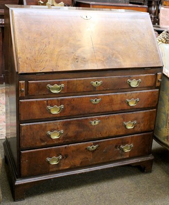 Lot 1206 - A George II Walnut Bureau, with serpentine...