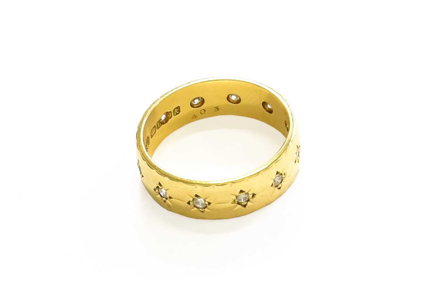 Lot 13 - An 18 Carat Gold Diamond Ring, the round...