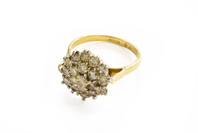 Lot 27 - An 18 Carat Gold Diamond Cluster Ring, the...