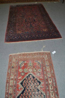 Lot 726 - A Saroukh prayer rug, the coral pink field with tree of life beneath the Mihrab enclosed by...