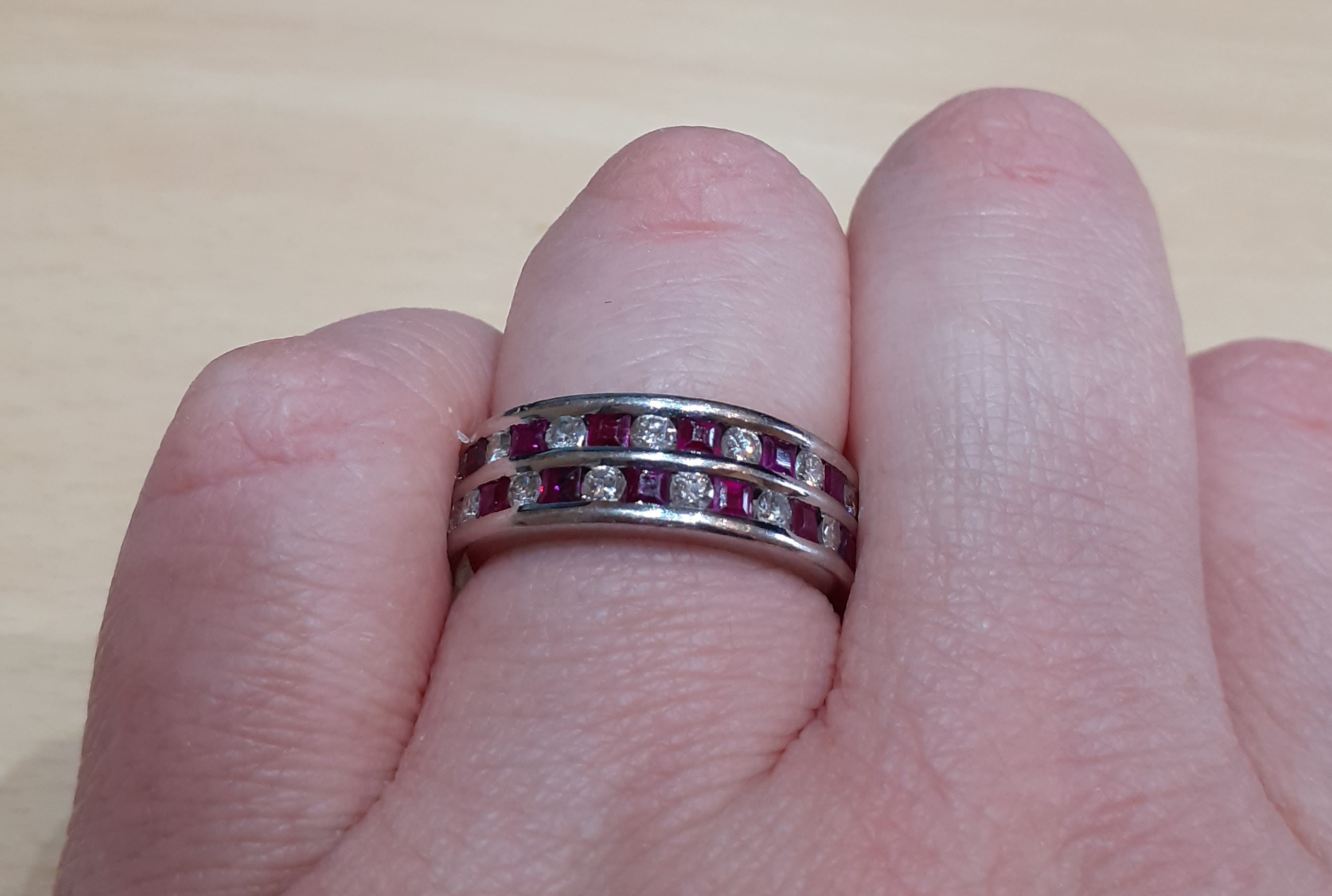 Lot 2019 - A Ruby and Diamond Ring two rows formed of