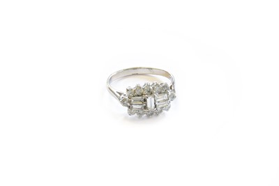 Lot 100 - A 9 Carat White Gold Diamond Cluster Ring, the...