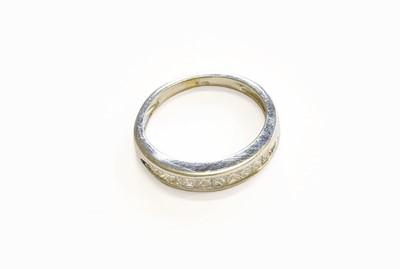 Lot 88 - An 18 Carat White Gold Diamond Half Hoop Ring,...