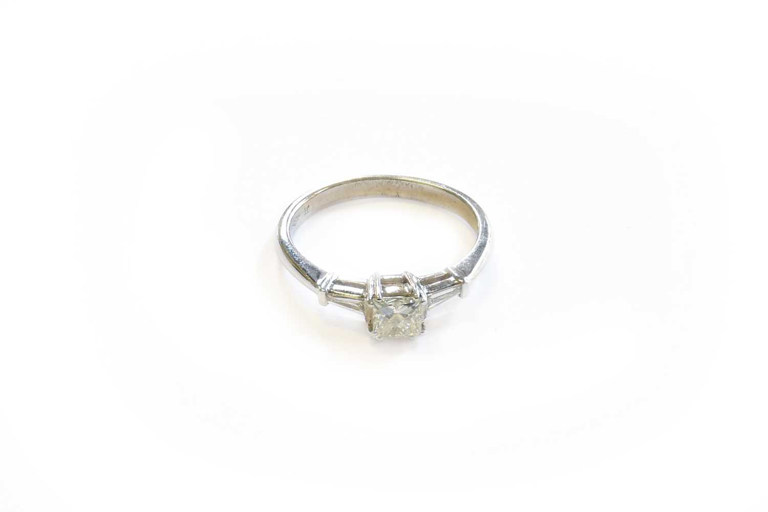 Lot 98 - A Diamond Solitaire Ring, the princess cut...