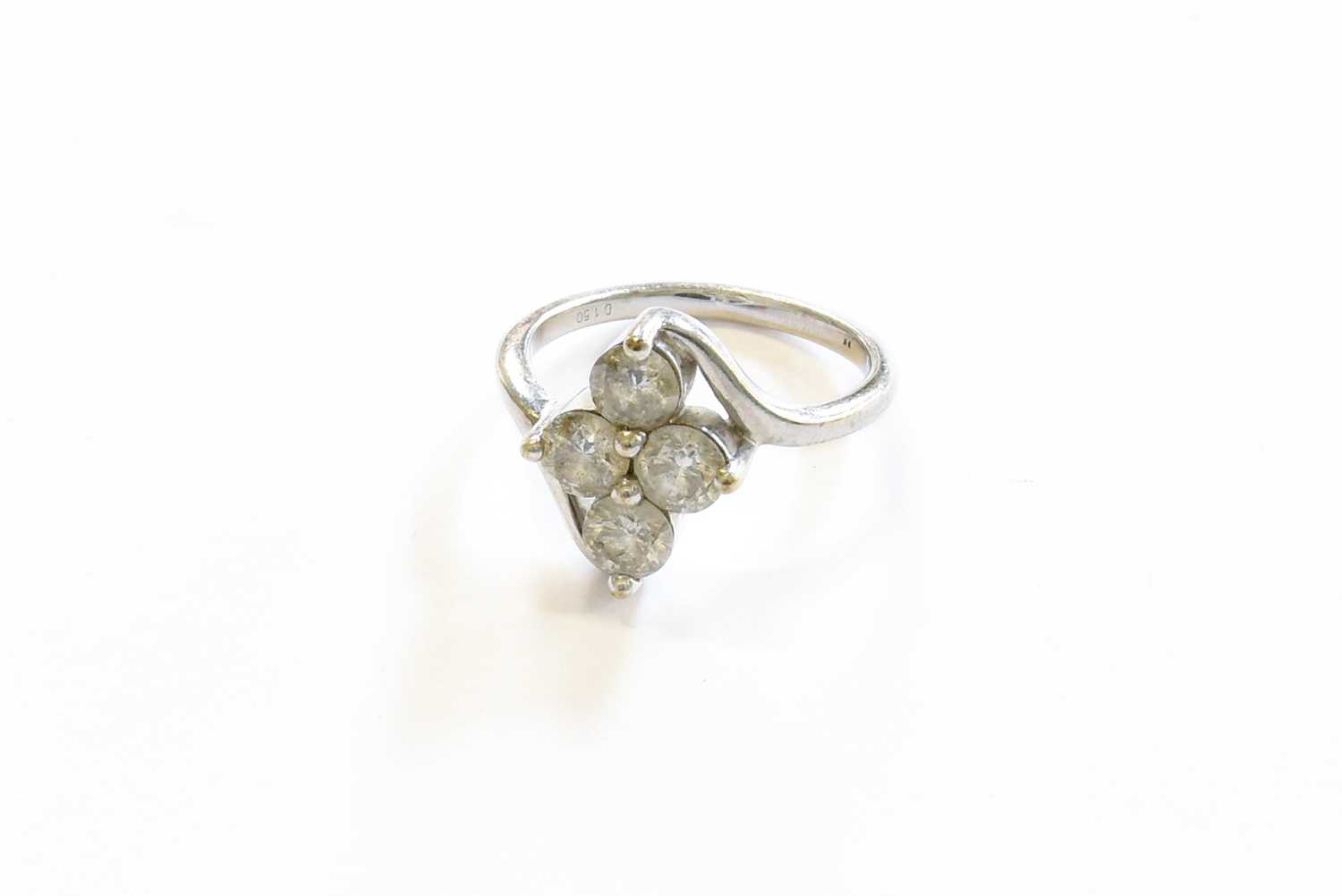 Lot 92 - A Diamond Four Stone Cluster Ring, the round...