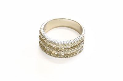 Lot 89 - A Diamond Ring, two rows of baguette cut...