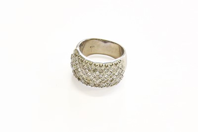 Lot 85 - An 18 Carat White Gold Diamond Half Hoop Ring,...