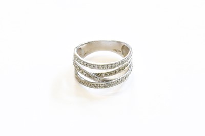 Lot 163 - An 18 Carat White Gold Diamond Crossover Ring,...