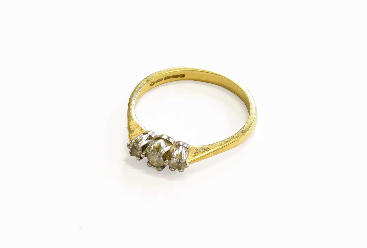 Lot 59 - An 18 Carat Gold Diamond Three Stone Ring, the...