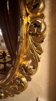 Lot 158 - A Gilt and Gesso Oval Wall Mirror, modern, the...