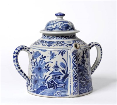 Lot 73 - An English Delft Posset Pot and Cover, circa 1720, of cylindrical form with twin strap handles...