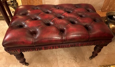 Lot 152 - A Set of Three Buttoned Red Leather Footstools,...