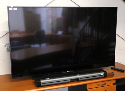 Lot 1112 - A Modern Sony 65'' LED TV (65x99305 model) and...