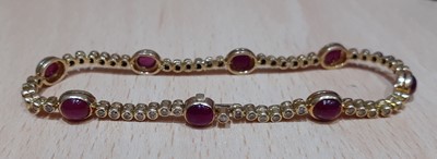 Lot 2050 - A Ruby and Diamond Bracelet eight cabochon...