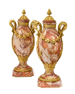 Lot 214 - A Pair of French Gilt Metal Mounted Varigated...