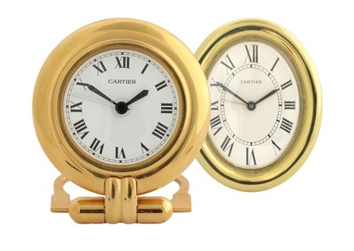Lot 215 - Two Travelling Alarm Cartier Strut Timepieces,...