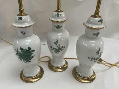 Lot 123 - A Set of Three Porcelain and Parcel Gilt Table...