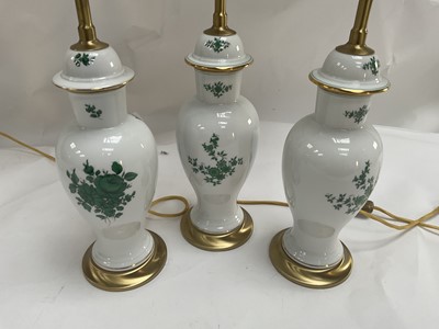 Lot 123 - A Set of Three Porcelain and Parcel Gilt Table...