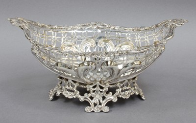 Lot 102 - A Victorian Silver Basket, by William Comyns,...
