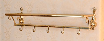 Lot 97 - A 20th Century Brass Wall Shelf, with baluster...