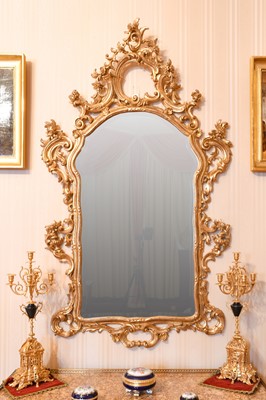 Lot 79 - An Italian Giltwood Composition Mirror, modern,...