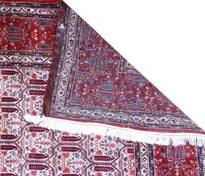 Lot 64 - Iranian Carpet, circa 1970 The ivory lattice...