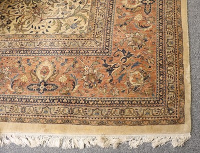 Lot 1271 - A Large Indian Carpet, with an Ivory field of...