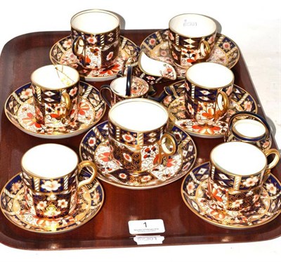 Lot 1 - A tray of Royal Crown Derby including seven cups and saucers, miniature watering can, a...