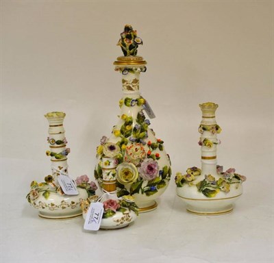 Lot 77 - A Rockingham Porcelain Bottle Vase and Stopper, circa 1835, encrusted and painted with naturalistic