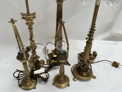 Lot 127 - A Pair of Brass Twin-Light Table Lamps, with...