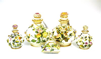 Lot 78 - A Pair of Rockingham Porcelain Bottle Vases and Stoppers, circa 1835, of squat baluster form...
