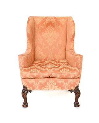 Lot 366 - A George III-Style Wing-Back Chair, covered in...