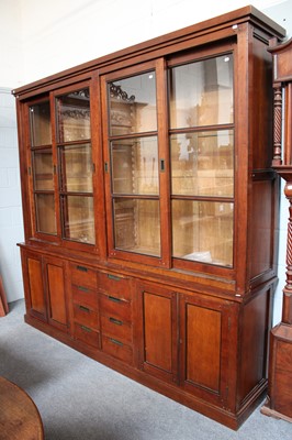 Lot 1308 - A Bespoke Made Stained Elm Bookcase, of...