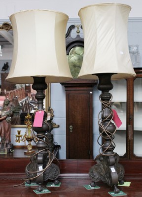 Lot 1006 - A Large Pair of Patinated Metal Table Lamps,...