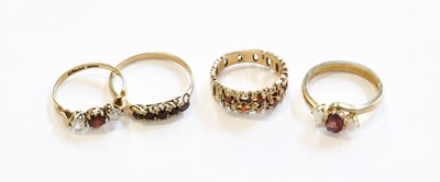 Lot 153 - Four 9 Carat Gold Garnet Rings, of varying...