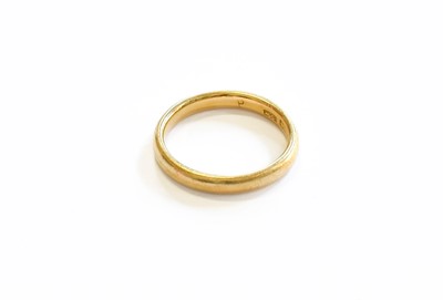 Lot 148 - An 18 Carat Gold Band Ring, finger size P