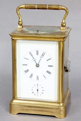 Lot 333 - A Brass Strike and Repeat Alarm Carriage Clock,...