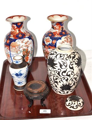 Lot 46 - A pair of Japanese Imari pattern vases and two others, one with wooden stand