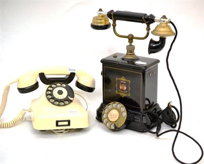 Lot 50 - Two vintage telephones: ";JYDSK"; metal telephone and a two tone pyramid phone