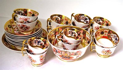 Lot 80 - A Spode Porcelain Tea and Coffee Service, circa 1810, painted in the Imari palette with a basket of
