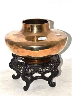 Lot 51 - A Chinese bronze bowl on large wooden stand
