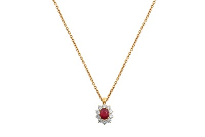 Lot 2047 - An 18 Carat Gold Ruby and Diamond Pendant on...
