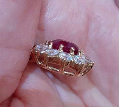 Lot 2047 - An 18 Carat Gold Ruby and Diamond Pendant on...