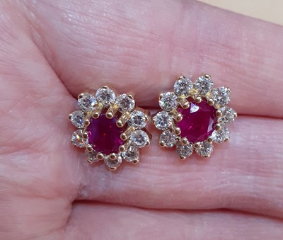 Lot 2048 - A Pair of 18 Carat Gold Ruby and Diamond...