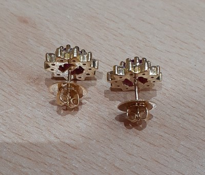 Lot 2048 - A Pair of 18 Carat Gold Ruby and Diamond...