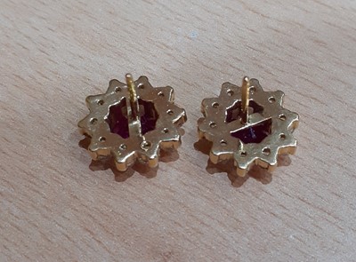 Lot 2048 - A Pair of 18 Carat Gold Ruby and Diamond...